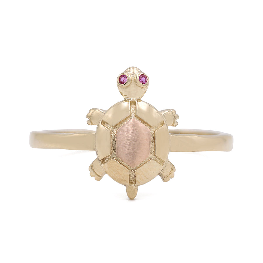 A Miral Jewelry fashion turtle ring with pink stones, crafted from 14K yellow and rose gold.