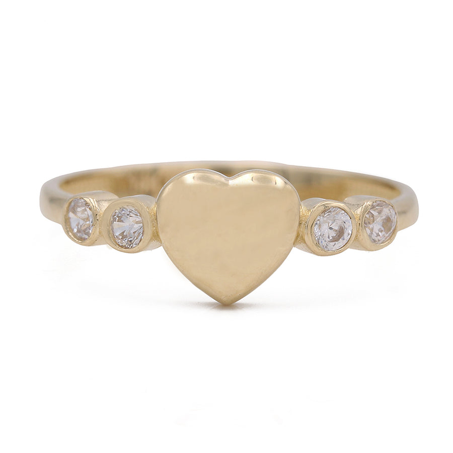 A Miral Jewelry 14K Yellow Gold Fashion Heart Design Ring with three Cubic Zirconias.