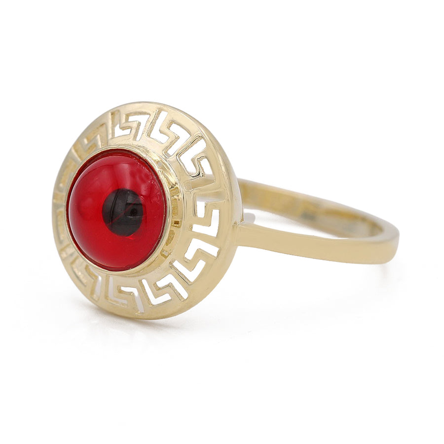 A fashionable Miral Jewelry 14K Yellow Gold Fashion Red Evil Eye Ring.