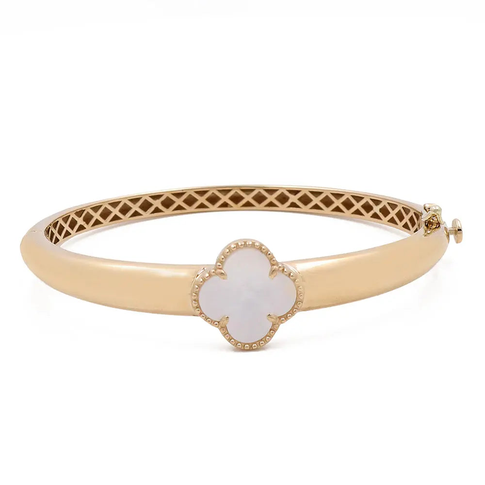 14K Yellow Gold Fashion Flower Women's Mother of Pearl Bracelet by Miral Jewelry with a clover-shaped mother of pearl set in the center, featuring a lattice interior design.