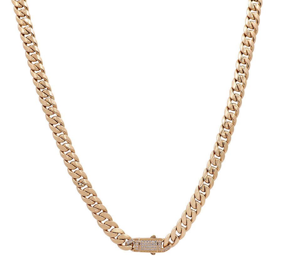 A 14K Yellow Gold Semi-Solid Cuban Link Chain with Cubic Zirconias clasp by Miral Jewelry.