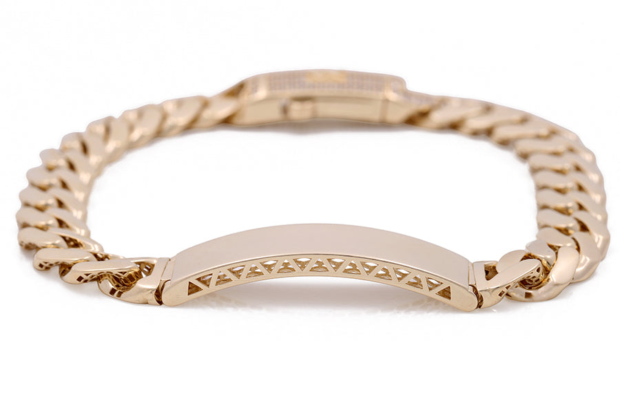 A Miral Jewelry 14K Yellow Gold Cuban Link bracelet with a gold plated clasp.