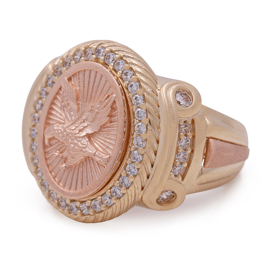 A Miral Jewelry 14K Yellow and Rose Gold Fashion Men's Ring with Center Eagle and Cubic Zirconias.