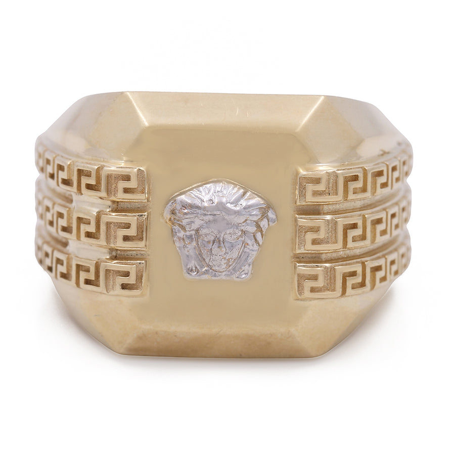 A Miral Jewelry 14K Yellow and White Gold Fashion Men's Ring adorned with an eagle head design, perfect for men.