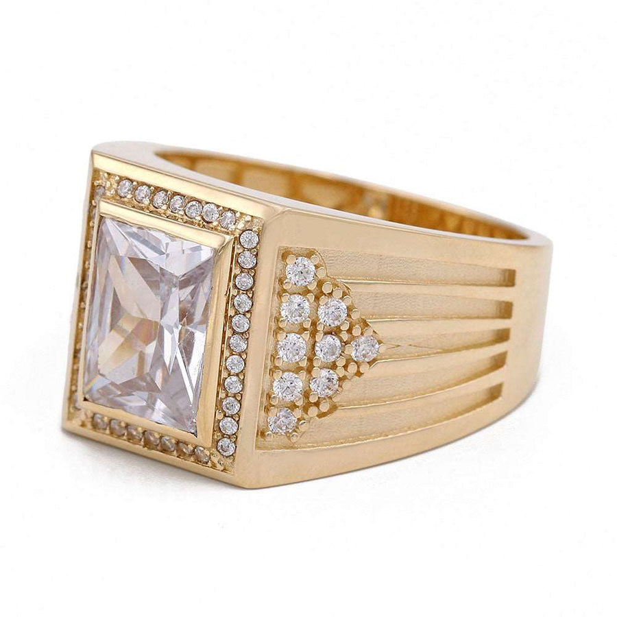 A Miral Jewelry 14K Yellow Gold Zirconia Color Center Stone Ring with Cubic Zirconias and diamonds.