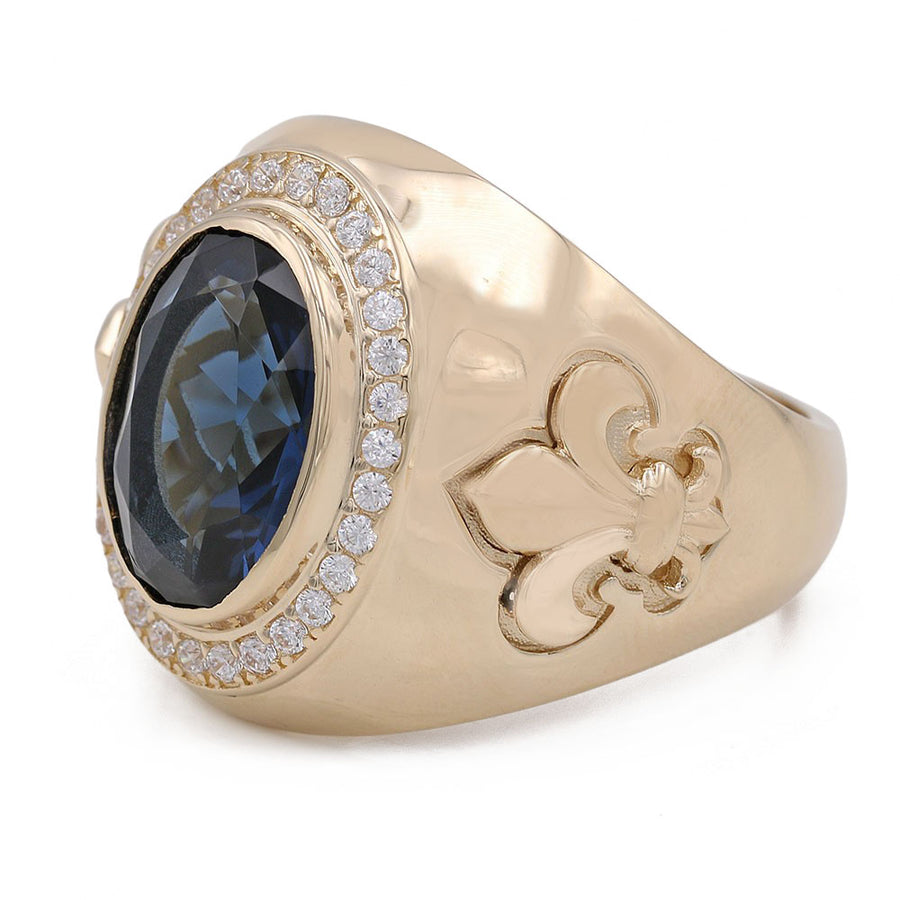 A Miral Jewelry 14K Yellow Gold Blue Color Center Stone Ring with Cubic Zirconias and diamonds.