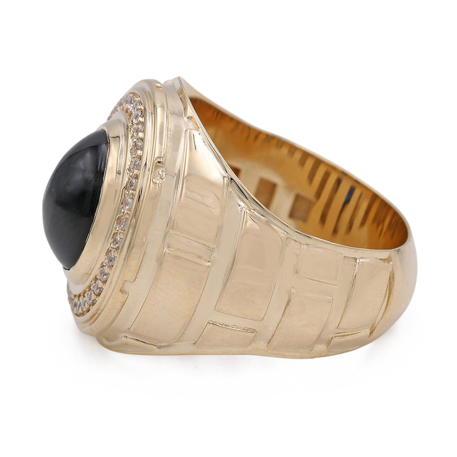 A Miral Jewelry 14K Yellow Gold Black Color Center Stone Ring with Cubic Zirconias and diamonds.