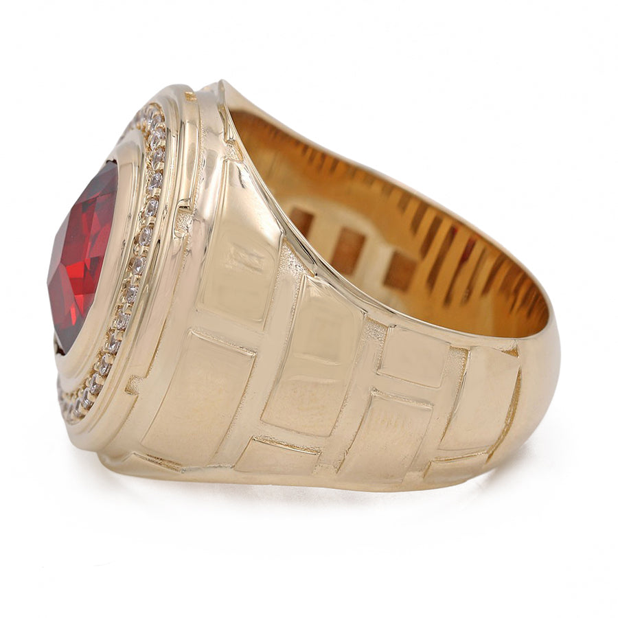 A Miral Jewelry yellow gold 14k fashion ring with a red CZ stone and diamonds.