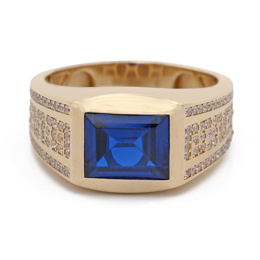 A gold ring featuring a blue sapphire and diamonds, crafted with the Miral Jewelry Yellow Gold 14k Fashion Ring With Blue Stone.
