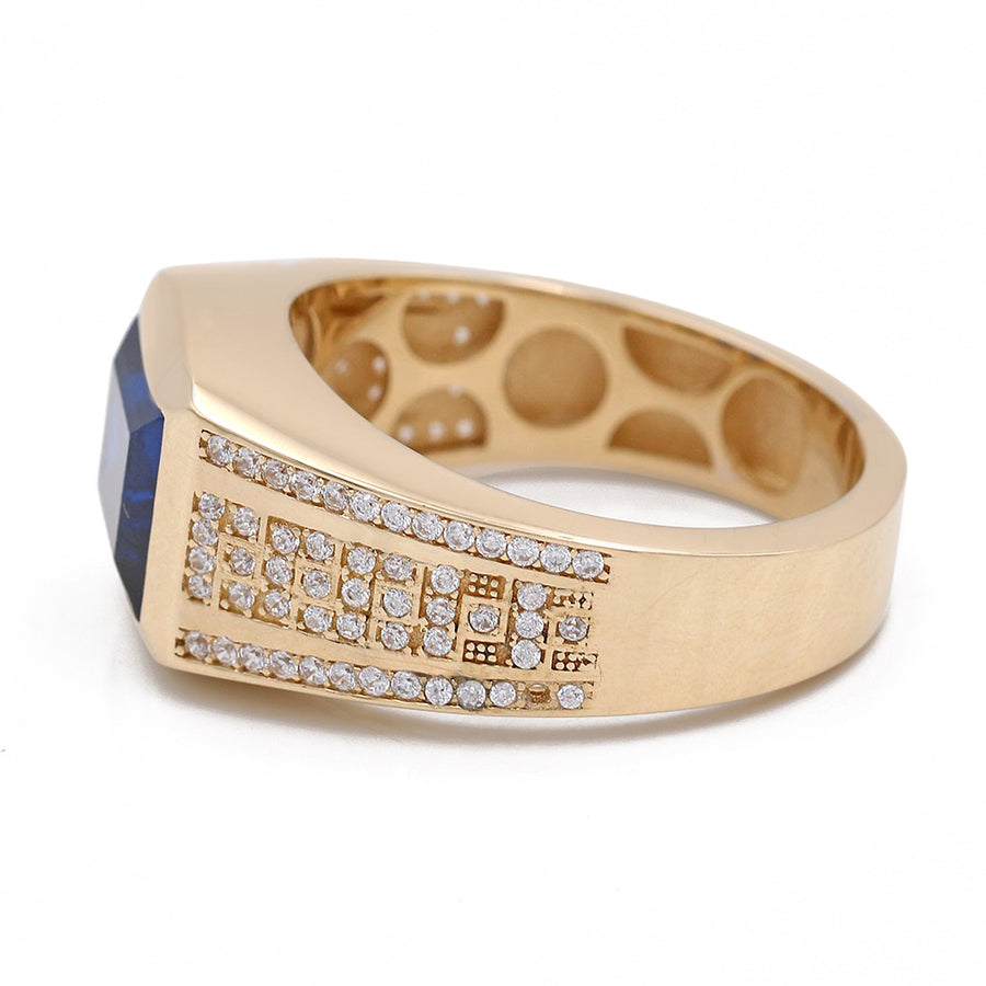 This stunning Miral Jewelry yellow gold 14k fashion ring features blue sapphires and diamonds. Perfect for adding a touch of elegance to any jewelry collection.