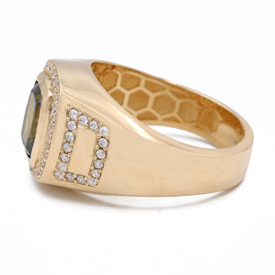 A Miral Jewelry yellow gold 14k fashion ring adorned with an emerald cut green CZ stone and accent diamonds.