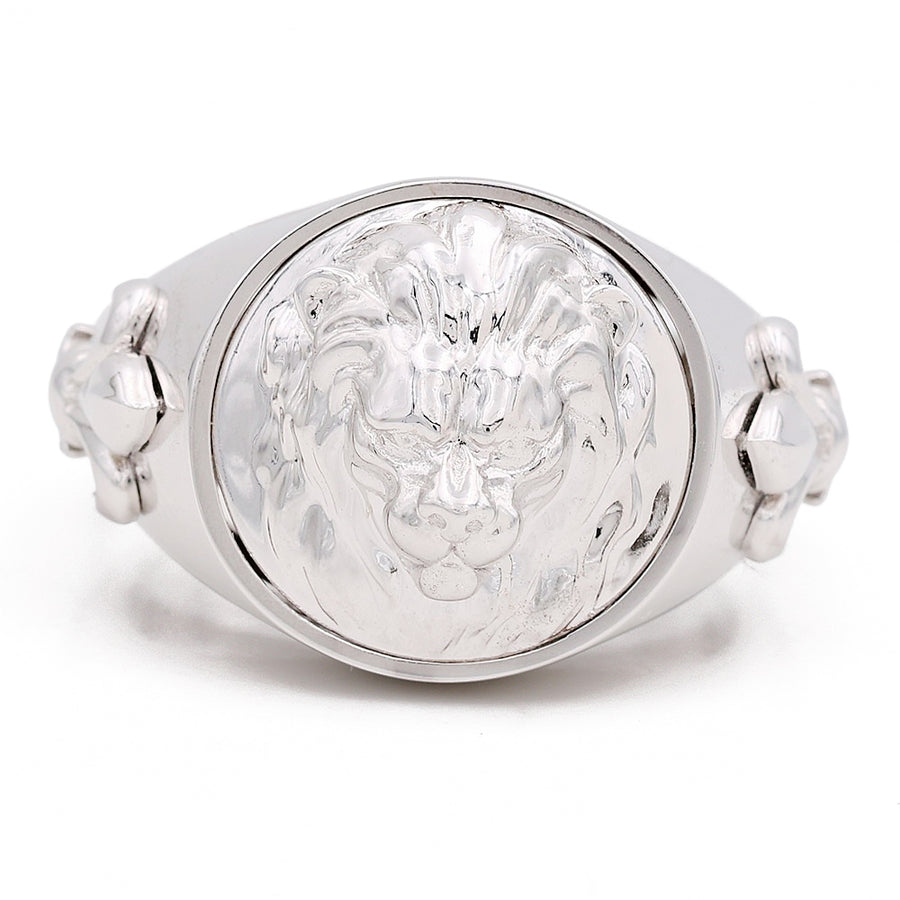 A silver men's Fashion Ring With Cz by Miral Jewelry with a lion head on it.