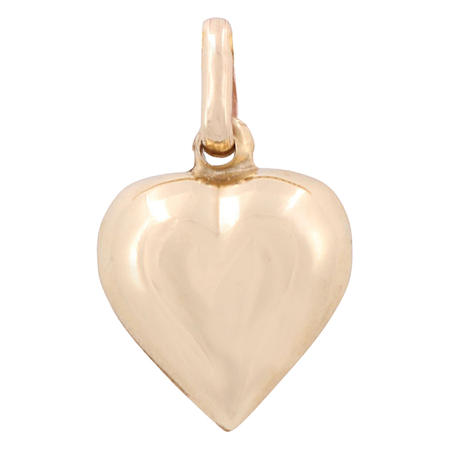 A Miral Jewelry 14K Yellow Gold Heart Shape Pendant on a white background.