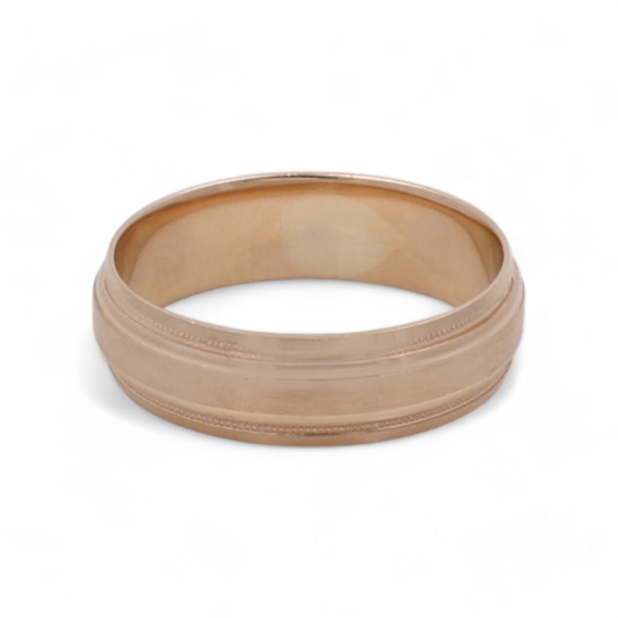Miral Jewelry's 14K Yellow Gold Men's Wedding Band with a simple design on a white background.