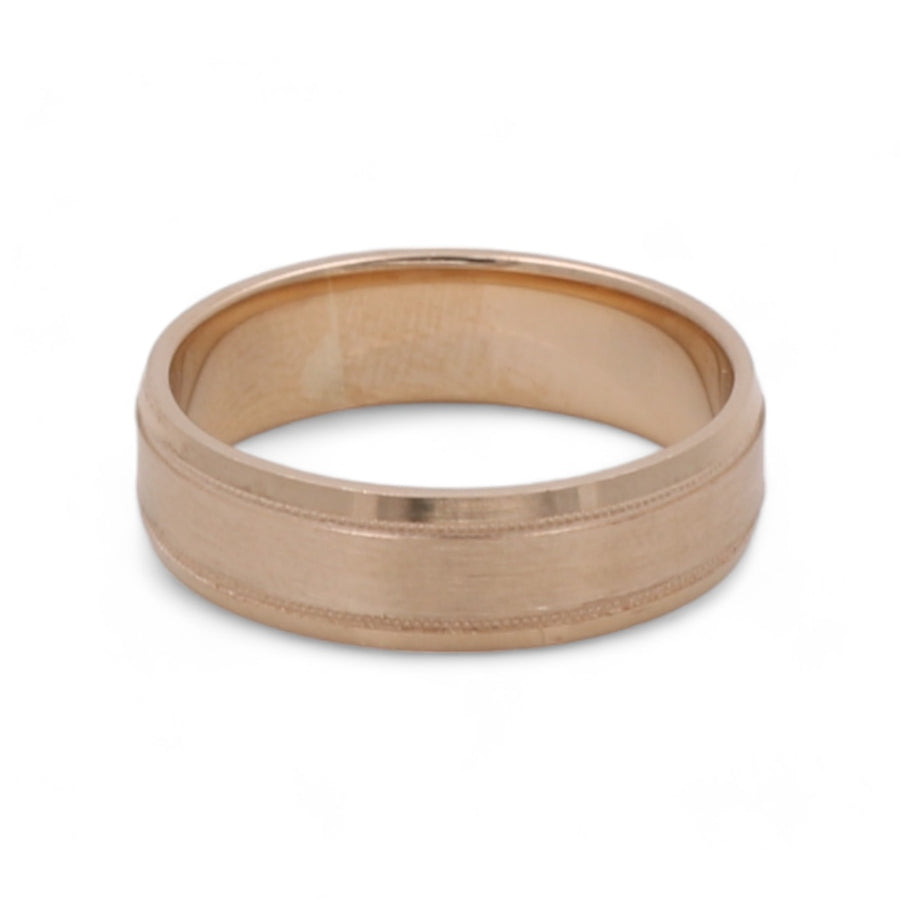 14K Yellow Gold Men's Wedding Band with a matte finish and a central groove detail symbolizing commitment by Miral Jewelry.