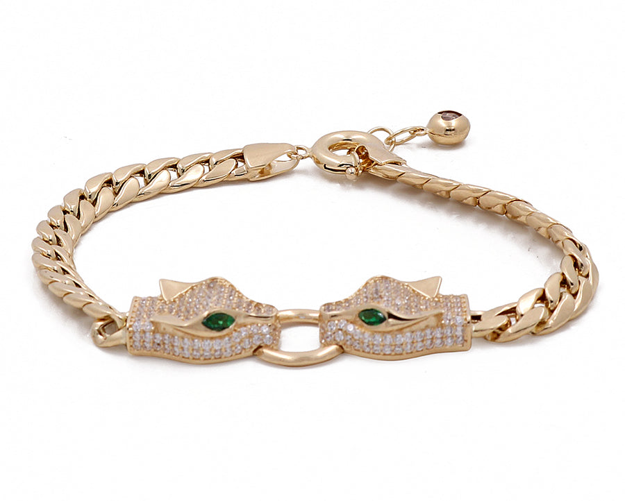 Miral Jewelry's 14K Yellow Gold Women's Fashion Dragon Heads with Cubic Zirconias Bracelet on a white background.