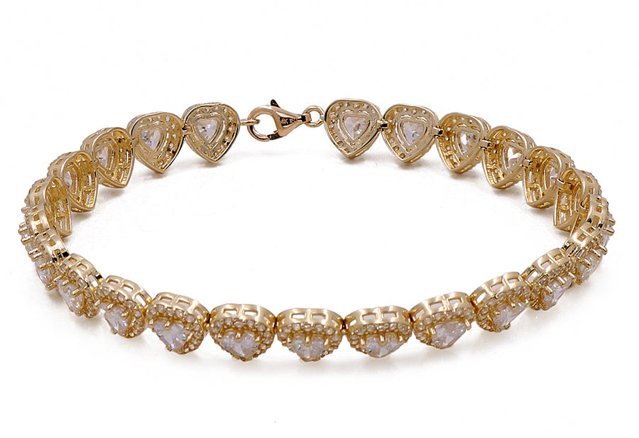 Golden and onyx Miral Jewelry tennis bracelet on a white background.