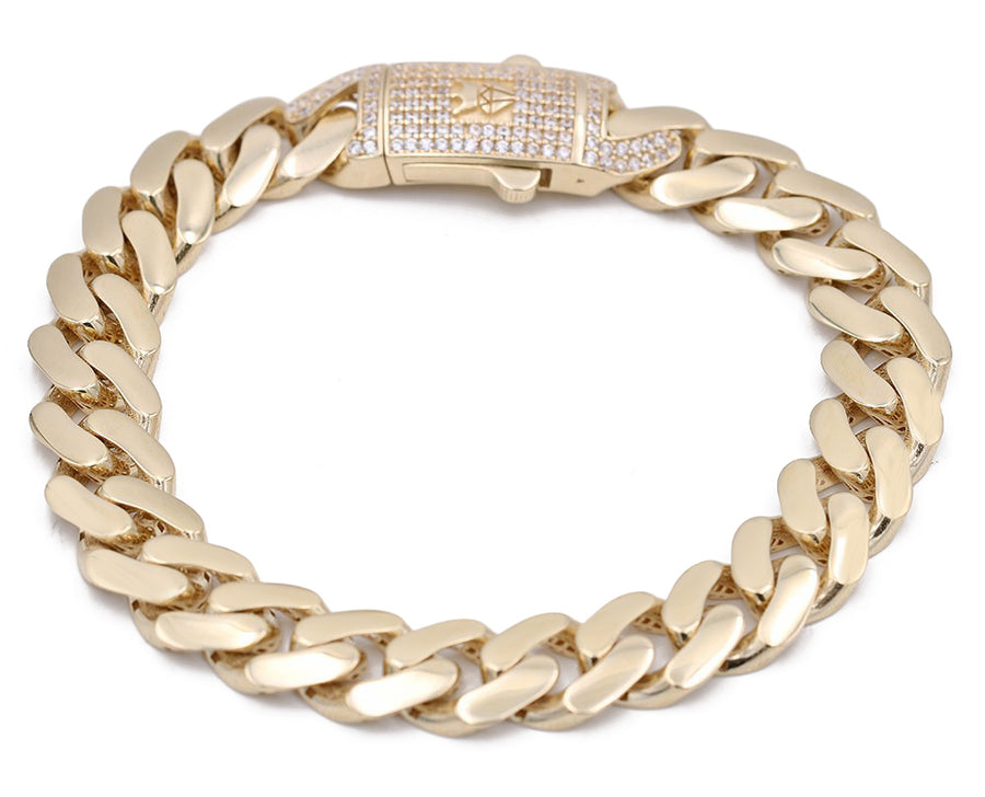 The Miral Jewelry Yellow Gold 10k Monaco Bracelet 8.5" Cz is a stunning piece of jewelry made with elegant yellow gold and features a sparkling diamond clasp.