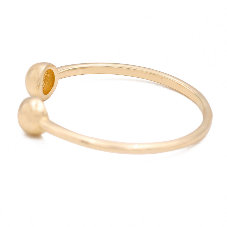 A timeless and fashion hoop ring, the Miral Jewelry 14K Yellow Gold Fashion Hoop Ring, featuring two balls elegantly placed on it.