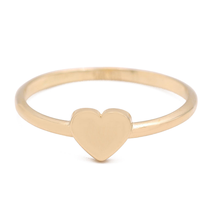 A fashionable Miral Jewelry 14K Yellow Fashion Single Heart Ring on a white background.