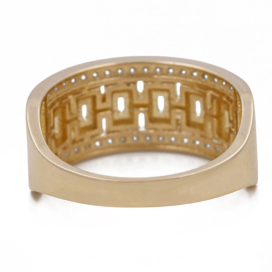 Miral Jewelry's 14K Yellow Gold Fashion Links Ring with Cubic Zirconias with an intricate geometric cut-out pattern on the inside surface, displayed on a white background.