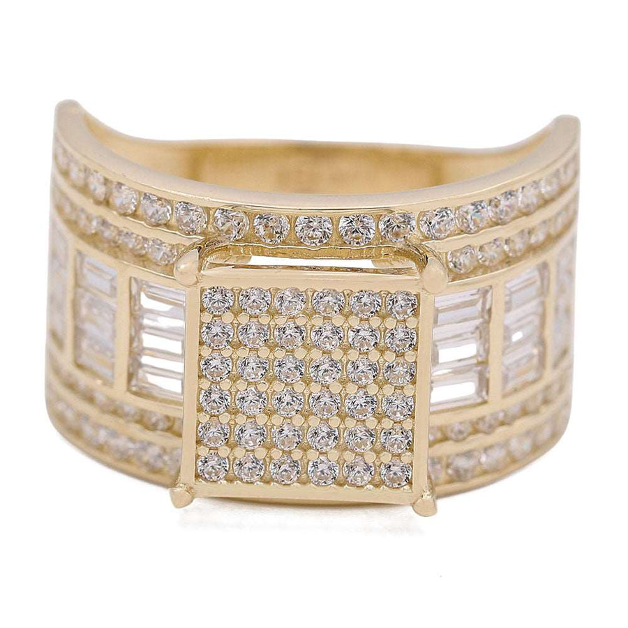 A stunning Miral Jewelry Yellow Gold 14k Engagement Ring adorned with baguette cut diamonds.