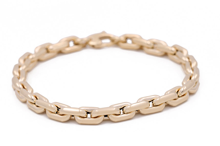 A 14K yellow gold plated chain bracelet.
Product: Miral Jewelry's 14K Yellow Gold Fashion Italian Link Bracelet.