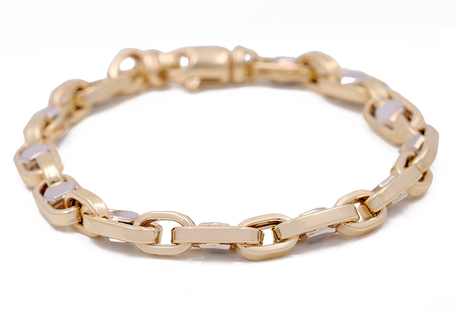 A Miral Jewelry 14K Yellow and White Gold Fashion Italian Link Bracelet with two links.