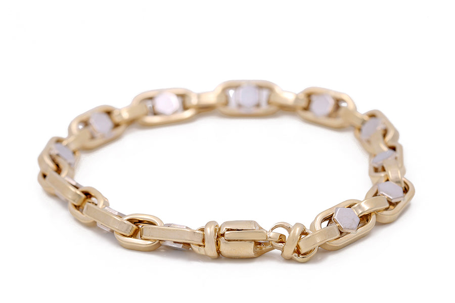 An Miral Jewelry 14K Yellow and White Gold Fashion Italian Link Bracelet with white stones.