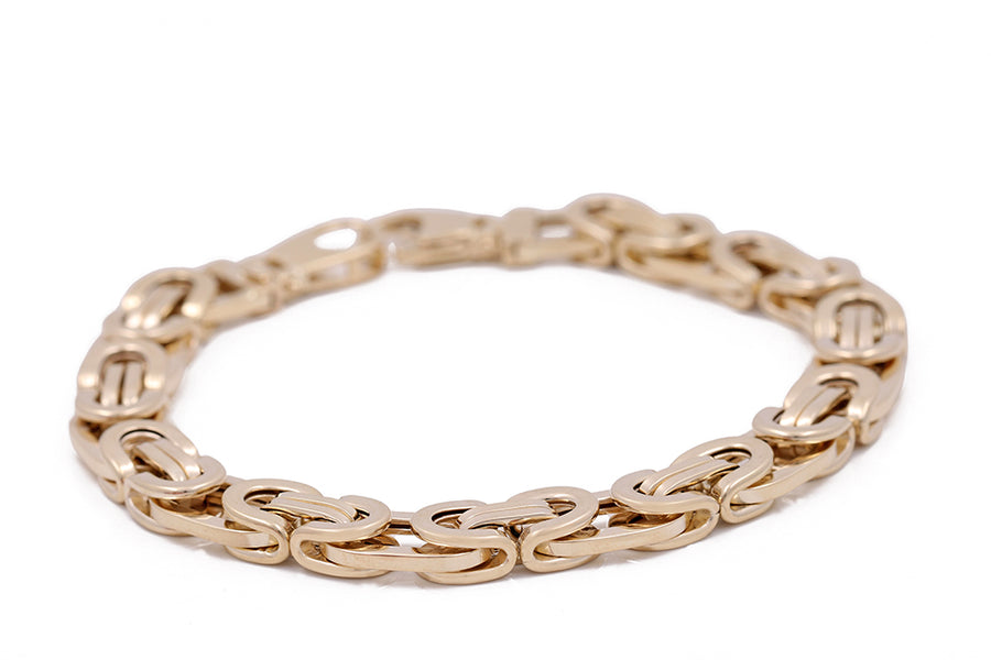 A fashionista's must-have - a Miral Jewelry 14K Yellow Gold Fashion Italian Link Bracelet with an oval Italian link.