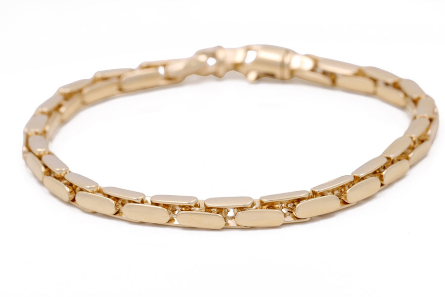 A Miral Jewelry 14K Yellow Gold Fashion Italian Link Bracelet with a square clasp.