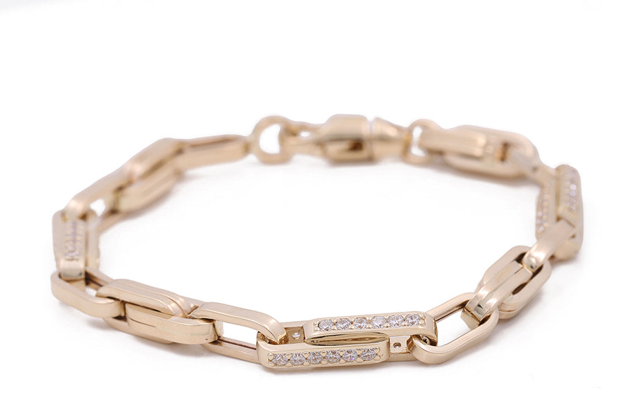A Miral Jewelry Italian link bracelet crafted in 14K yellow gold with diamonds.