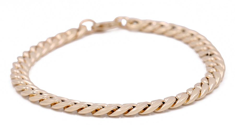 A Miral Jewelry 14K Yellow Gold Fashion Italian Link Bracelet, made of 14K yellow gold, with a clasp.