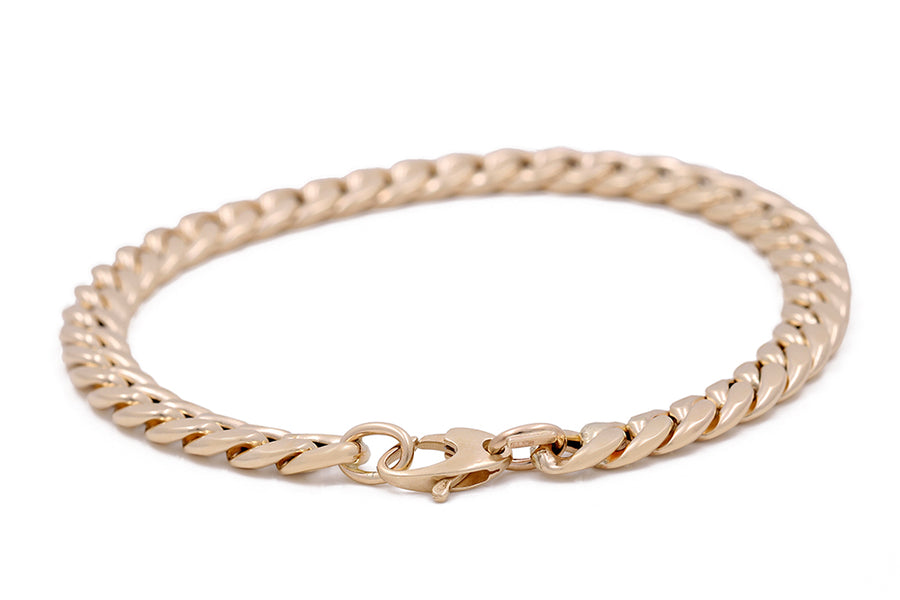 A high-quality, fashionable 14K yellow gold Italian link bracelet with a secure clasp from Miral Jewelry.