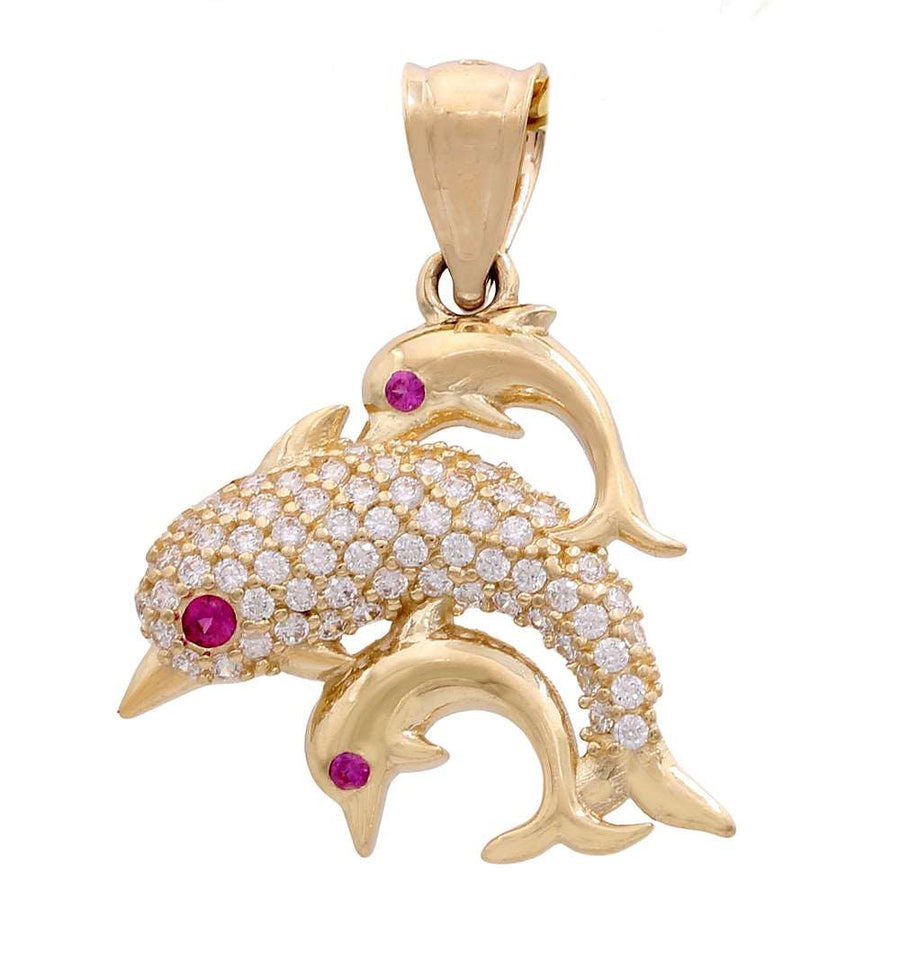 A Miral Jewelry 14K Yellow Gold Dolphin Trio with Red Color Stones and Cubic Zirconias pendant adorned with rubies and diamonds.