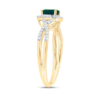 A stunning Miral Jewelry 10k Yellow Gold Heart Emerald Fashion Ring 5/8 Cttw, adorned with sparkling diamonds.