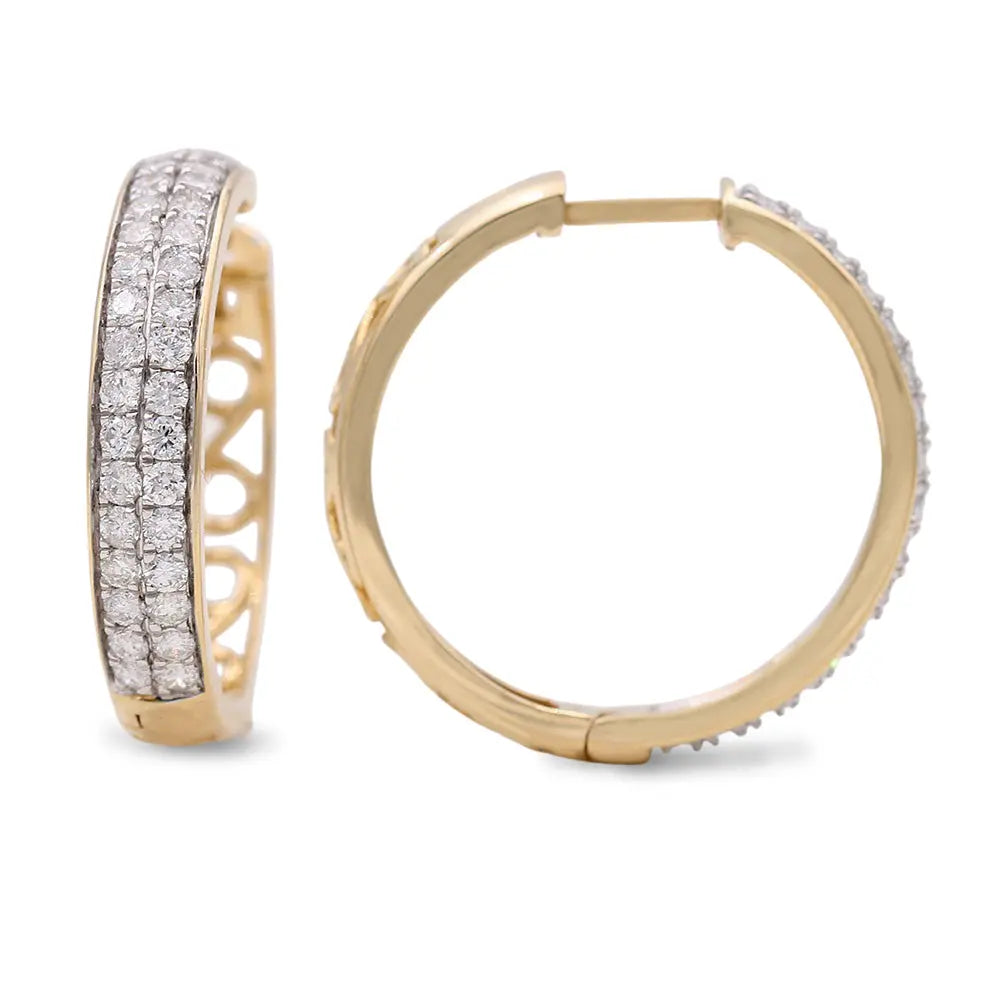 A pair of Miral Jewelry Yellow Gold 14k Medium Hoop Diamond Earrings With 1.00Tw Round Diamonds, shown from the side and front angles.