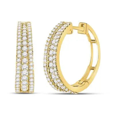 Medium gold hoop earrings with three rows of round diamonds, set along the outer surface, elegantly crafted from yellow 14 karat gold. Introducing the Medium Hoop Diamond Earrings by Miral Jewelry.