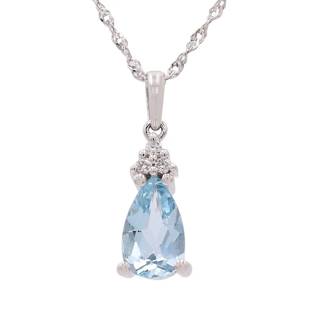 A stunning Miral Jewelry Fancy Link Necklace featuring a pear-shaped blue gemstone pendant, adorned with small round diamonds at the top, set in 14 karat silver.
