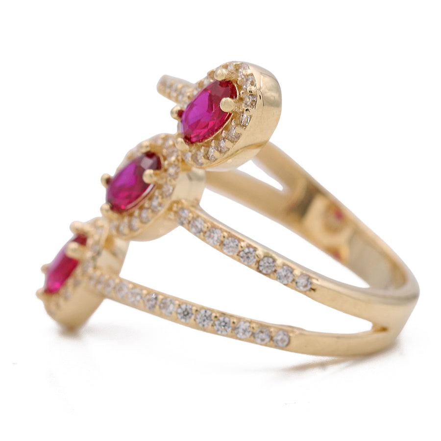 A Yellow Gold 14k Fashion Ring With Red Cz from Miral Jewelry, perfect for women.