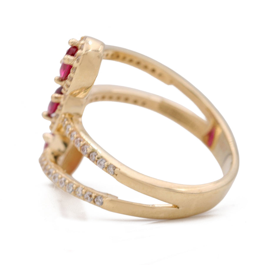 A Miral Jewelry Yellow Gold 14k Fashion Ring adorned with Red Cz stones and diamonds.