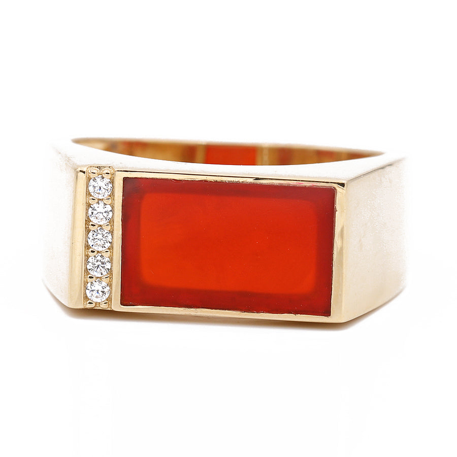A Miral Jewelry yellow gold 14k fashion ring with a red stone and CZ.