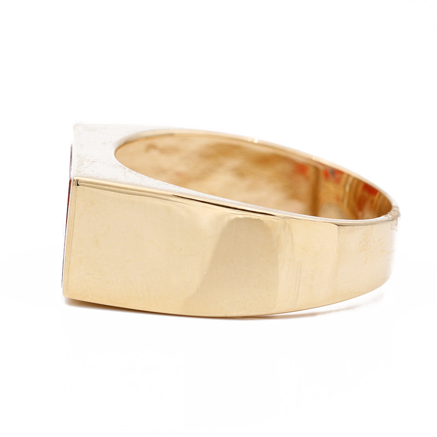 A Miral Jewelry yellow gold 14k fashion ring with a red stone and cz, perfect for a fashionable look.