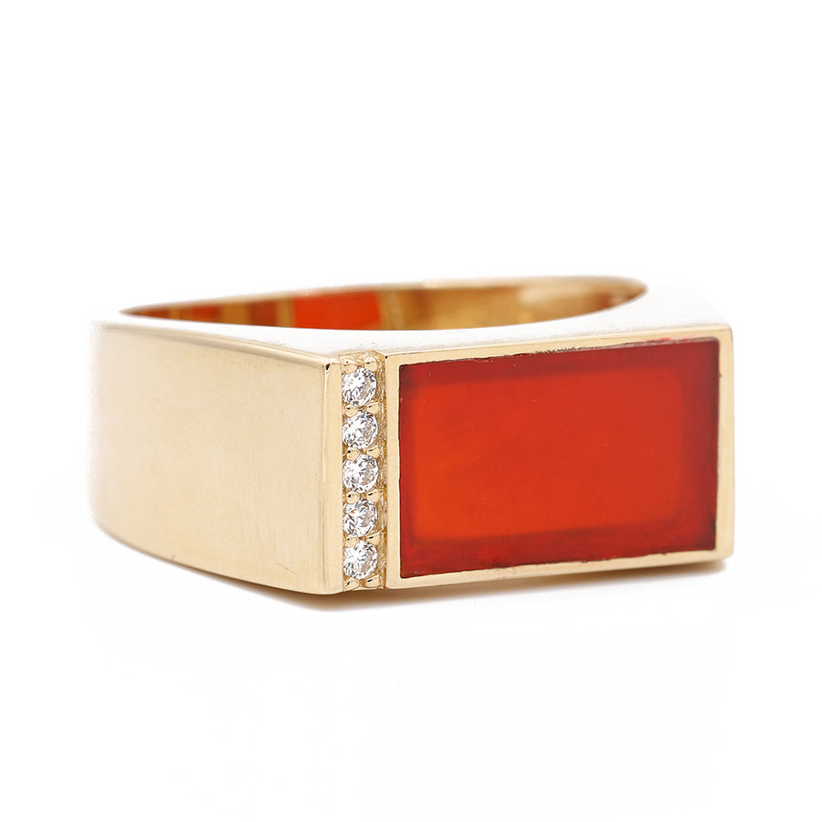 A Miral Jewelry yellow gold 14k fashion ring with a red stone and CZ.
