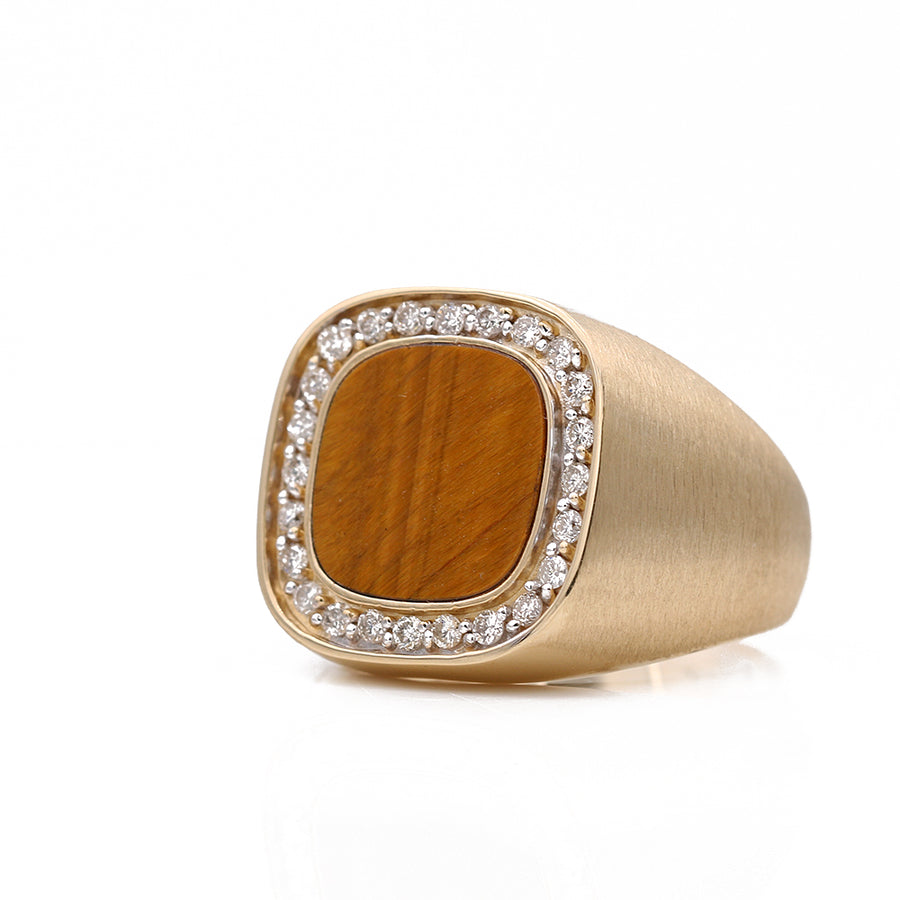 This Miral Jewelry men's yellow 14k contemporary fashion ring features a stunning tiger eye stone complemented by round diamonds.
