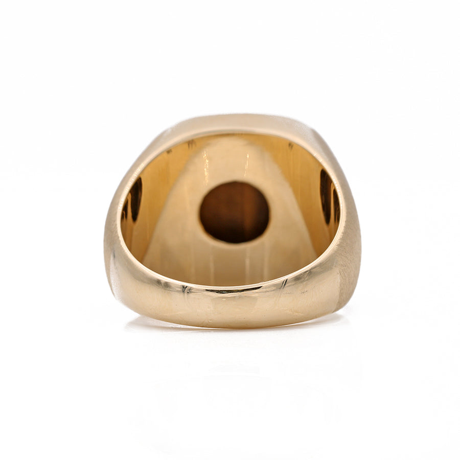 A Men's Yellow 14k Contemporary Fashion Ring with a Tiger Eye stone by Miral Jewelry.