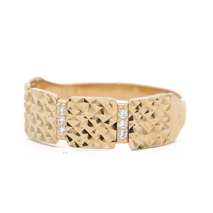 A Miral Jewelry yellow gold 14k wedding band adorned with diamonds and CZ accents.