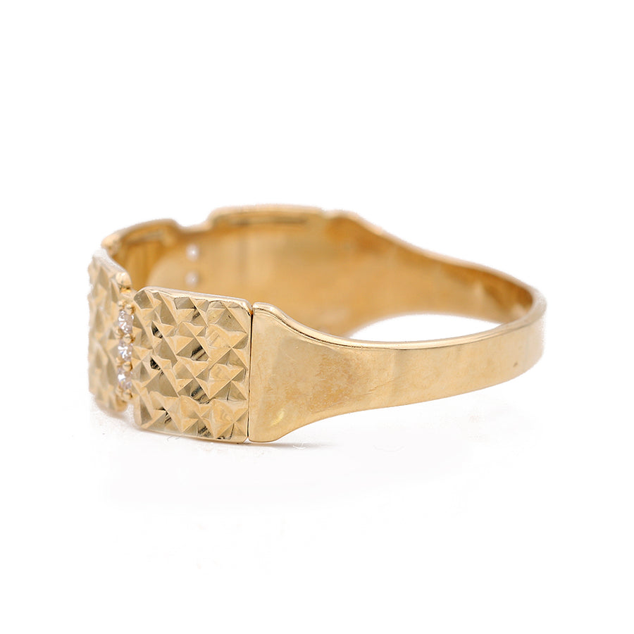 A Miral Jewelry Yellow Gold 14k Wedding Band With Cz with diamonds on it.