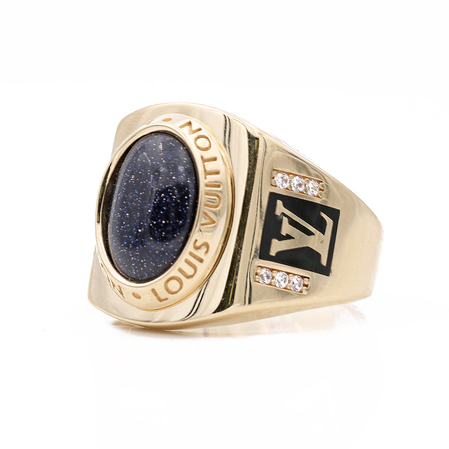 A Miral Jewelry men's 14k Yellow Gold Fashion Ring With Onyx band, black stone, and accent diamonds.