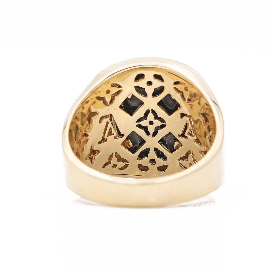 A Miral Jewelry men's fashion ring with 14k yellow gold and black diamonds.